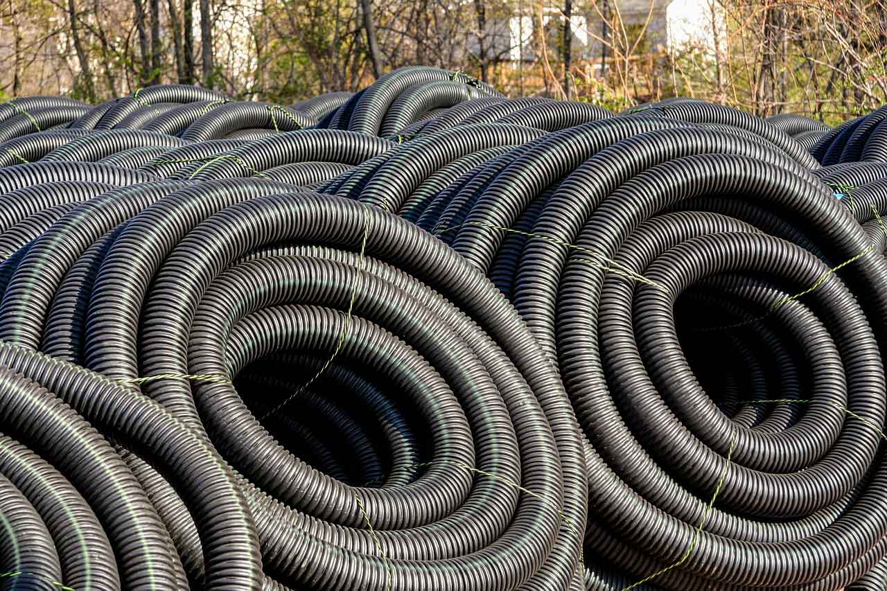 Image of coiled drainage pipes in Berkshire and Surrey - Let the digger do it, flood prevention in Berkshire and Surrey.